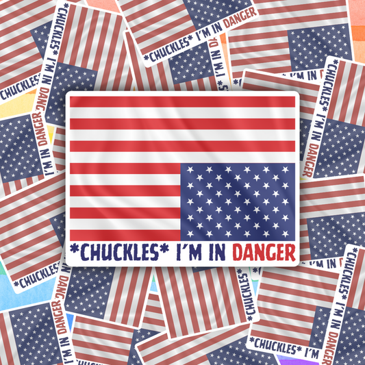 Vinyl sticker of upside down American flag with ‘Chuckles I’m in Danger’ text – political protest design